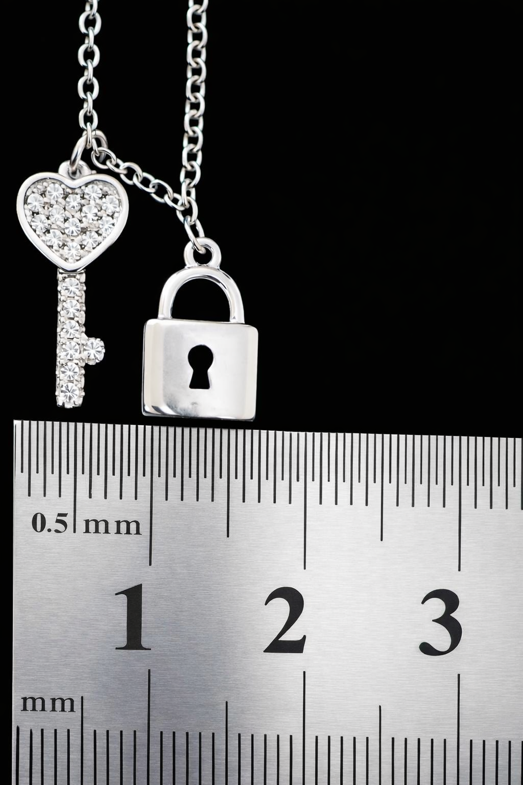 925 Silver cubic zirconia heart key and padlock charms attached to chain